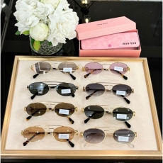 Miu miu Sunglasses